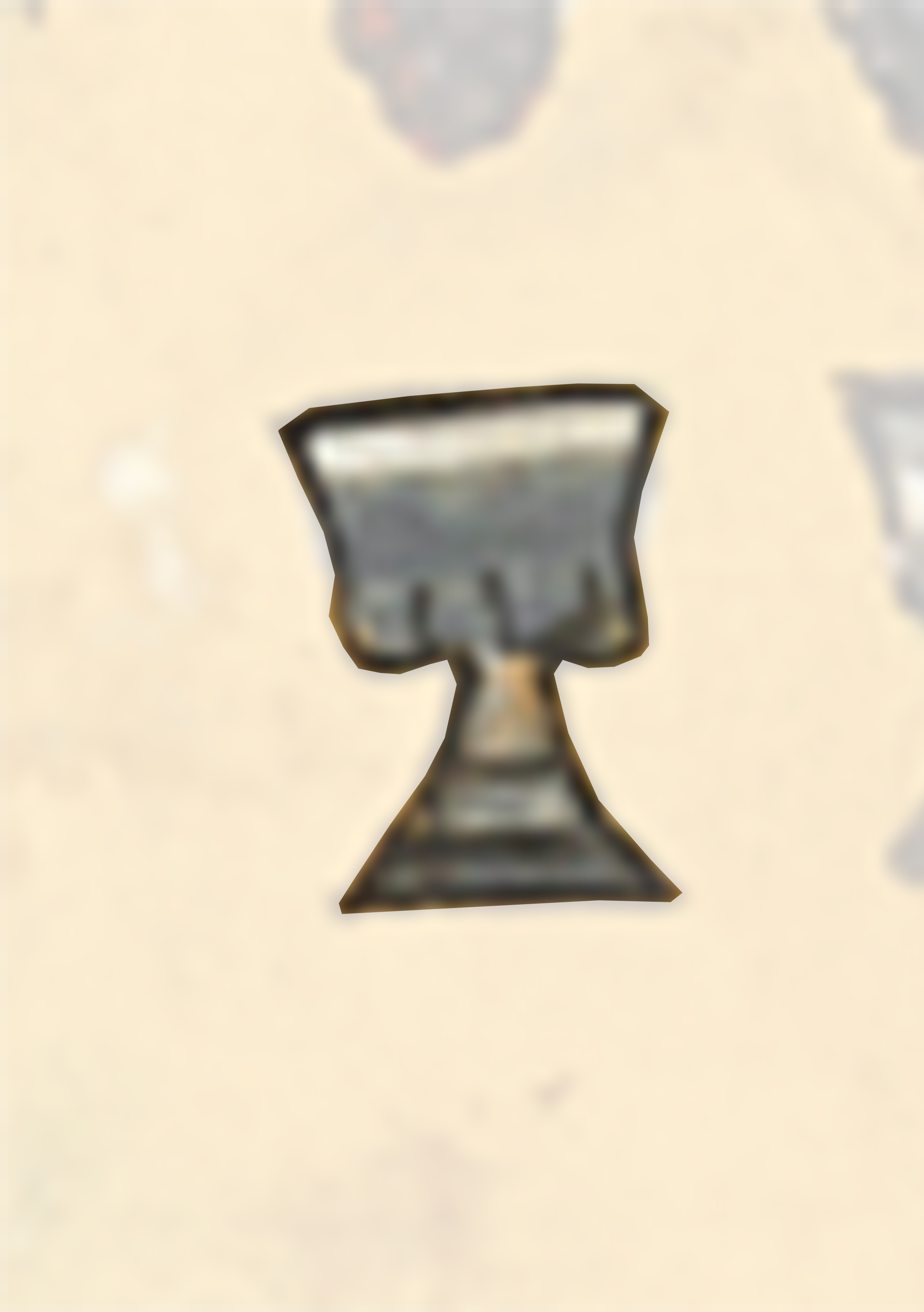 Small Metal Object With A Hole In The Middle
