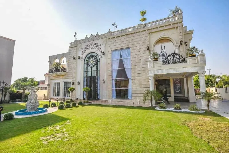 Spacious 1 Kanal Lawn & 1 Kanal Built Home Near Dolmen Mall and Large Park