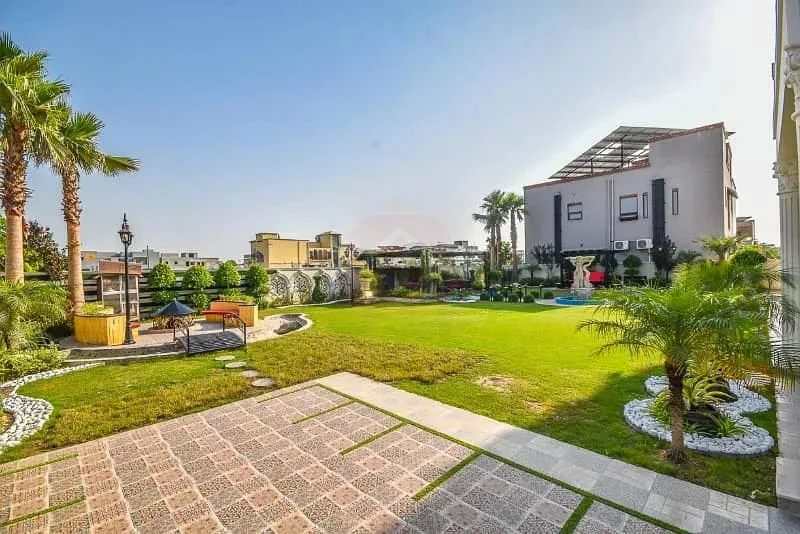 Spacious 1 Kanal Lawn & 1 Kanal Built Home Near Dolmen Mall and Large Park