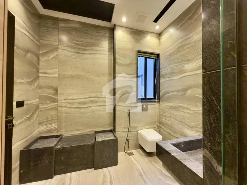 A Luxurious Mansion With 10 KV Sollar. Wide Approach Excellent Location DHA 9 Town House For Sale