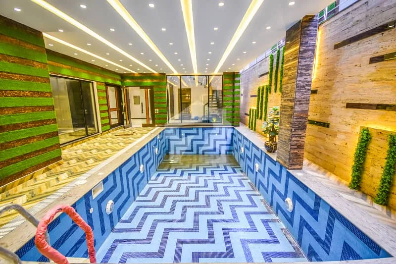 Contemporary Bungalow with Full Basement Pool & Home Theater for Sale
