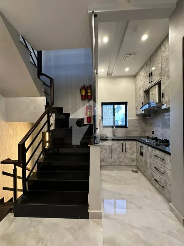 Elegant Mansion with 100 Feet Access in Prime Location Near Doll Men Mall