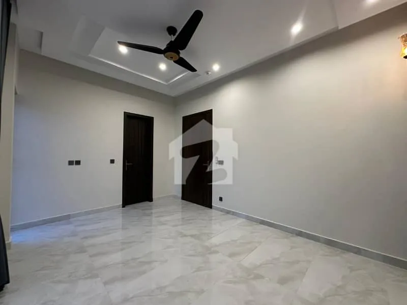 Elegant Mansion with 100 Feet Access in Prime Location Near Doll Men Mall