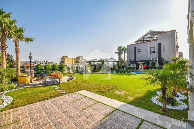 Spacious 1 Kanal Lawn & 1 Kanal Built Home Near Dolmen Mall and Large Park
