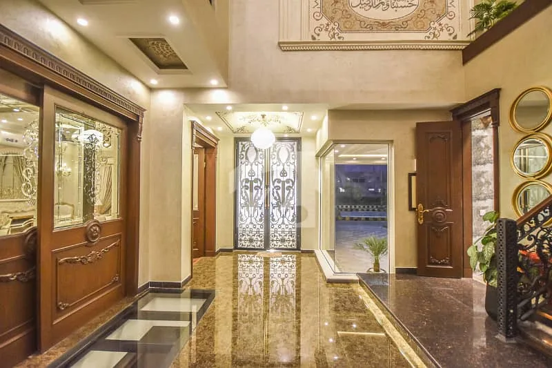 Spacious 1 Kanal Lawn & 1 Kanal Built Home Near Dolmen Mall and Large Park