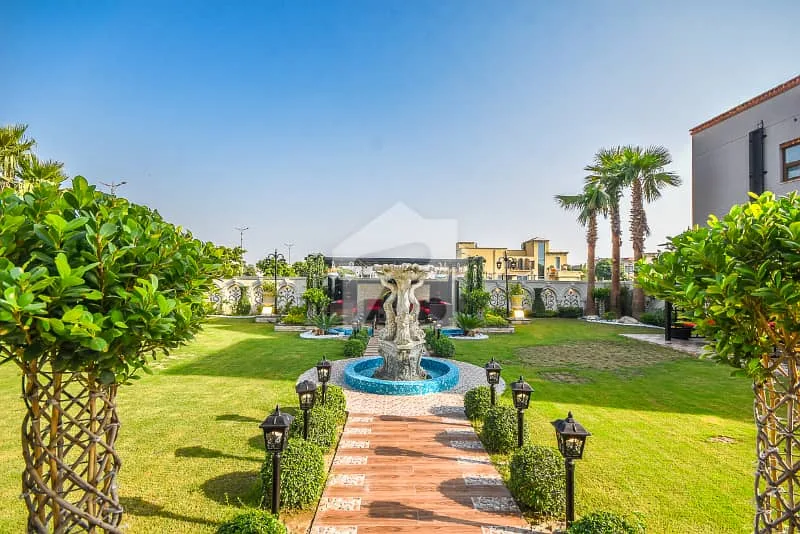 Spacious 1 Kanal Lawn & 1 Kanal Built Home Near Dolmen Mall and Large Park
