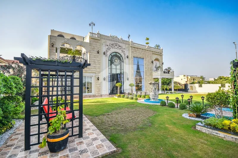 Spacious 1 Kanal Lawn & 1 Kanal Built Home Near Dolmen Mall and Large Park
