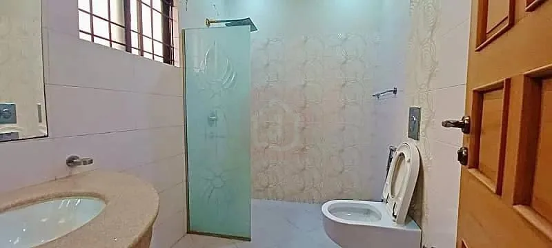 Modern One Kanal Bungalow in DHA Lahore Near Park and Market
