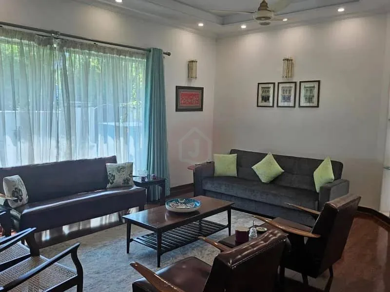 Modern One Kanal Bungalow with 5 Bedrooms and Lift in DHA Lahore