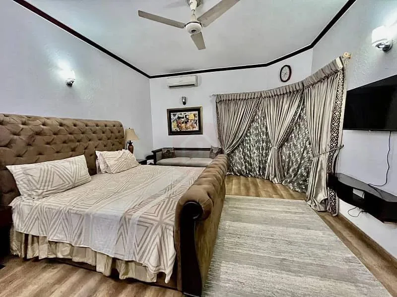Slightly Used One Kanal Ultra-Modern Bungalow Facing Park in DHA Lahore