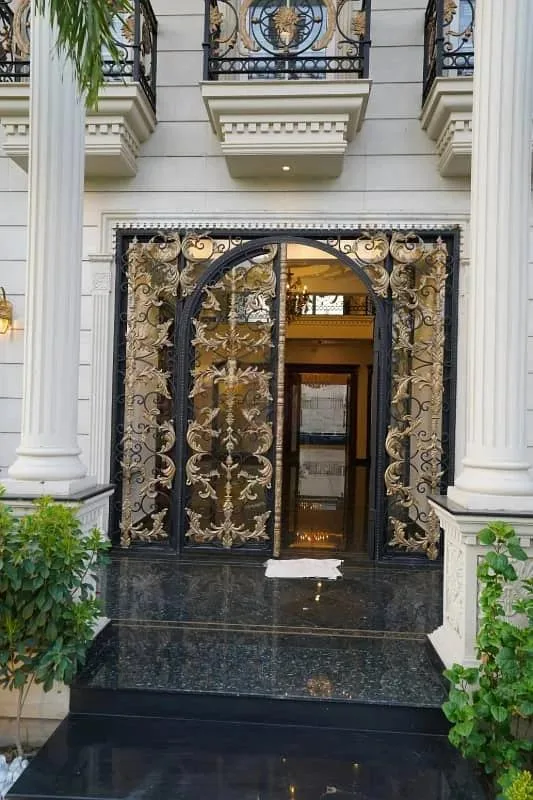 Elegant 2 Kanal Spanish-Style Bungalow with Basement and Pool in DHA Lahore