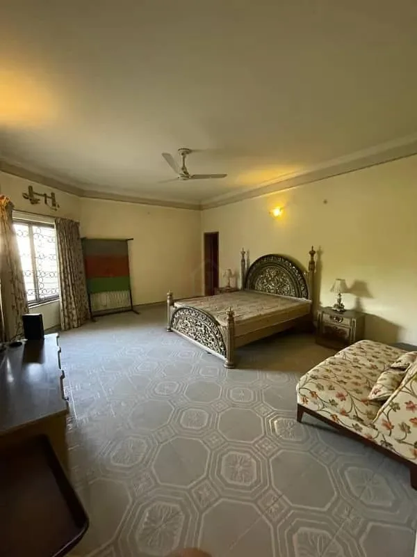 Stunning 2 Kanal 8-Bedroom Bungalow with Full Basement for Sale in DHA Lahore