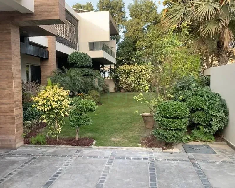Stunning 2 Kanal 7 Bedroom Bungalow with Basement and Pool in DHA Lahore