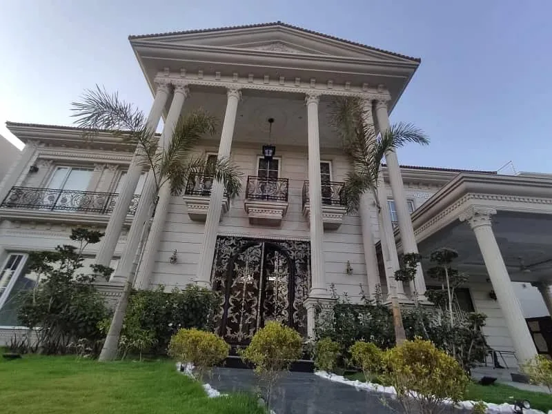 Elegant 2 Kanal Spanish-Style Bungalow with Basement and Pool in DHA Lahore