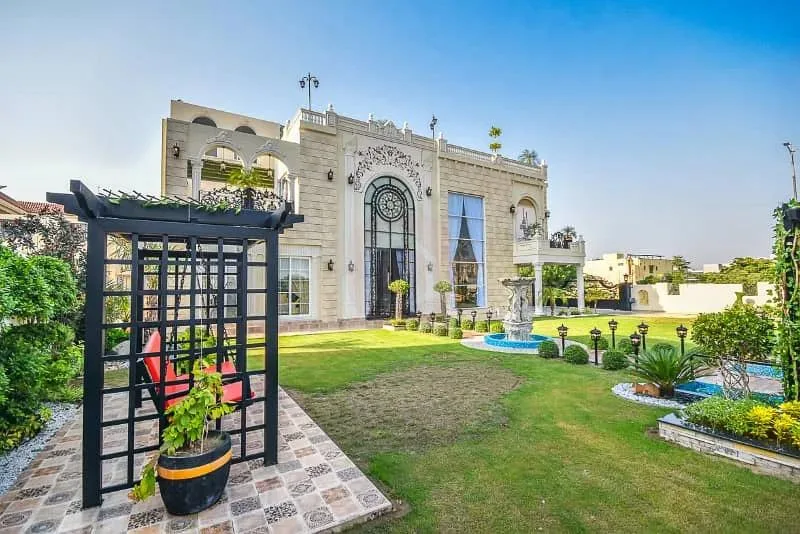 Spacious 1 Kanal Lawn & 1 Kanal Built Home Near Dolmen Mall and Large Park