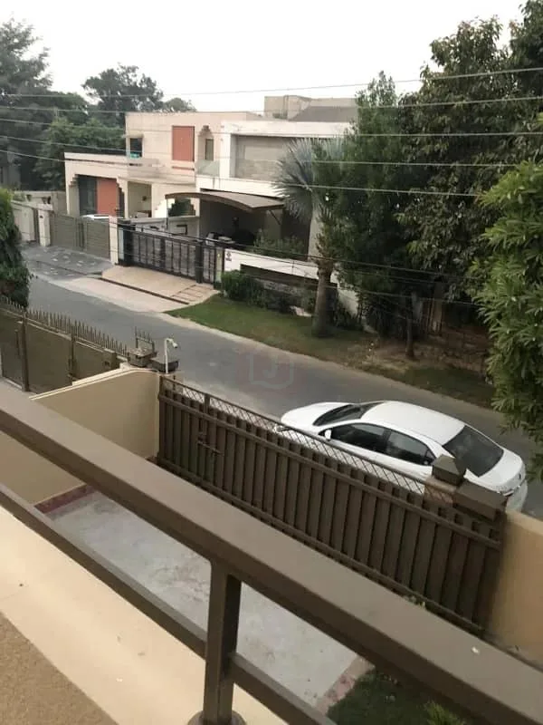 One Kanal Used Bungalow Available in DHA Lahore Near Park & Market
