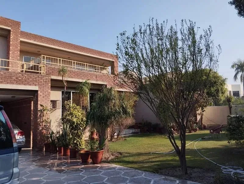 Stunning 2 Kanal Bungalow in DHA Lahore, Near Park and Market