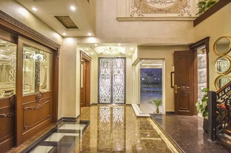 Spacious 1 Kanal Lawn & 1 Kanal Built Home Near Dolmen Mall and Large Park