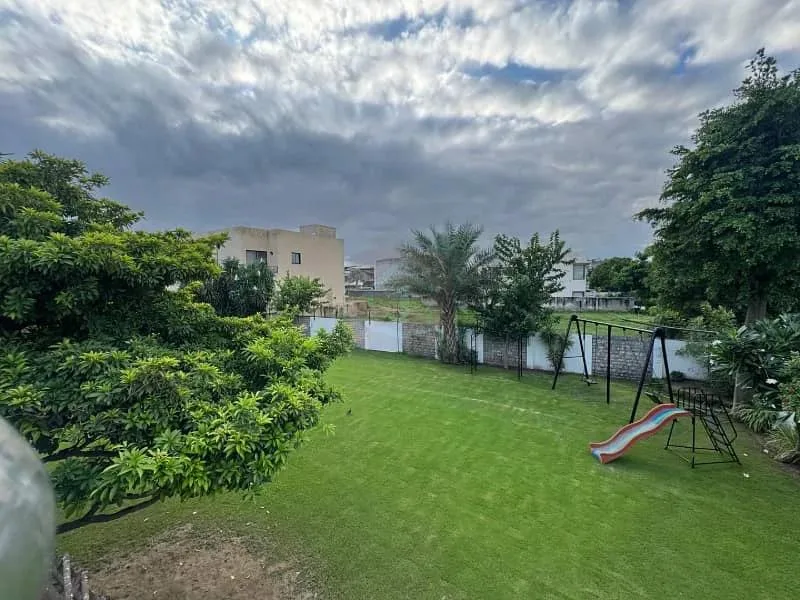 Stunning 1 Kanal Corner Bungalow with Full Basement in DHA Lahore