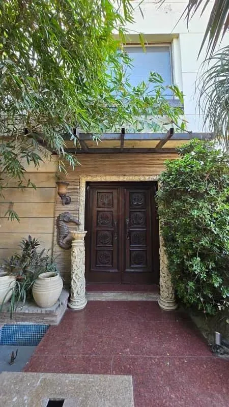 One Kanal Modern Bungalow for Sale in DHA Lahore Near Park and Market