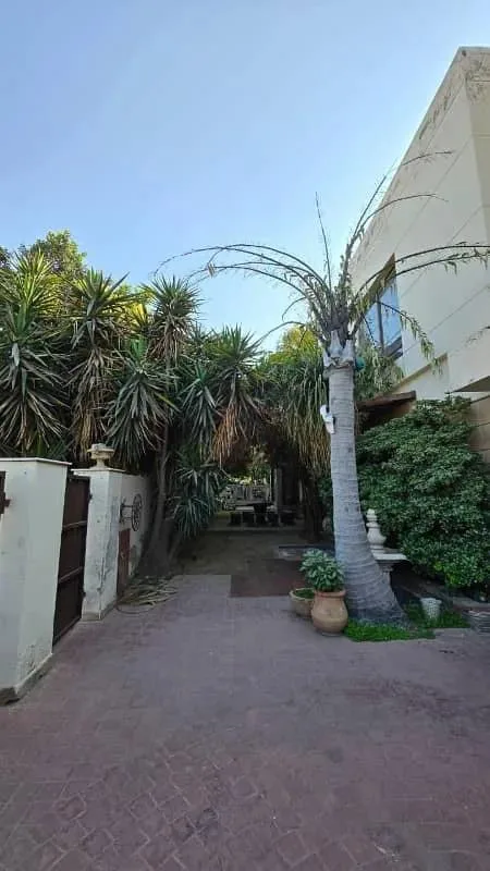 One Kanal Modern Bungalow for Sale in DHA Lahore Near Park and Market