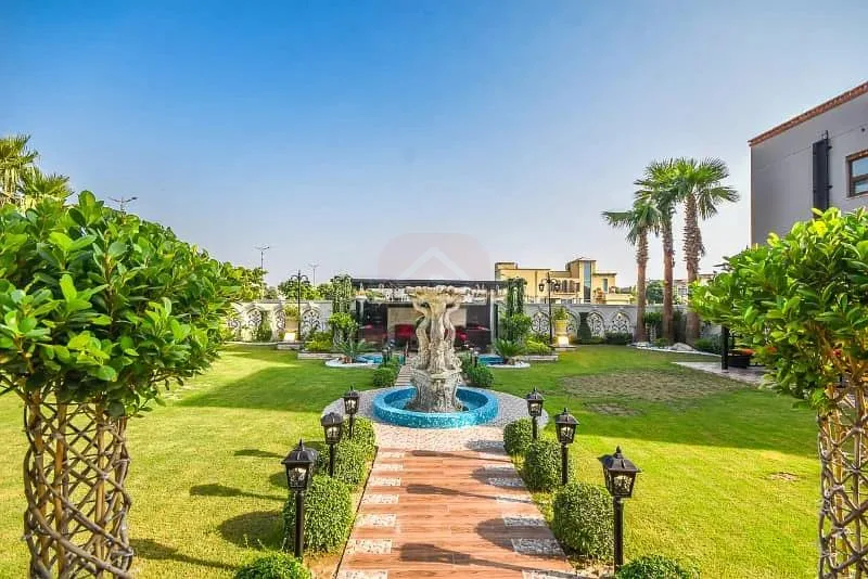 Spacious 1 Kanal Lawn & 1 Kanal Built Home Near Dolmen Mall and Large Park