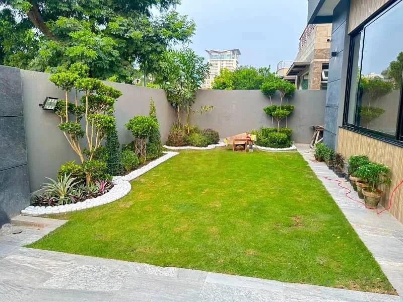Stunning One Kanal Luxury Bungalow with Basement and Pool in DHA Lahore