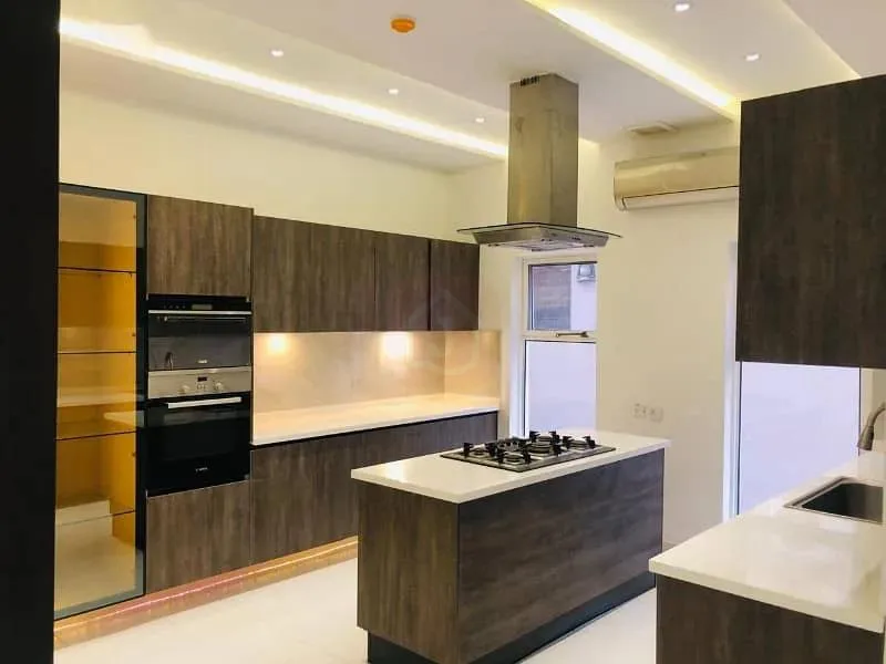 One Kanal Modern Bungalow for Sale in DHA Lahore with Solar and Servant Quarters