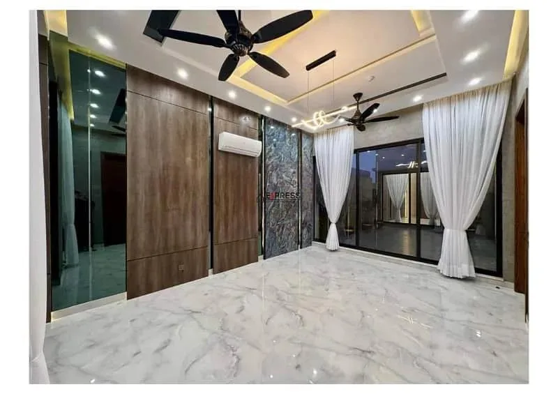 Stunning One Kanal Luxury Bungalow with 2 Servant Quarters for Sale in DHA Lahore