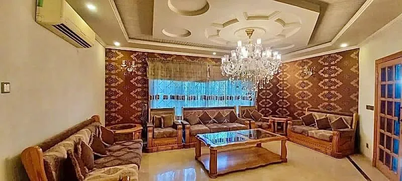 Modern One Kanal Bungalow in DHA Lahore Near Park and Market