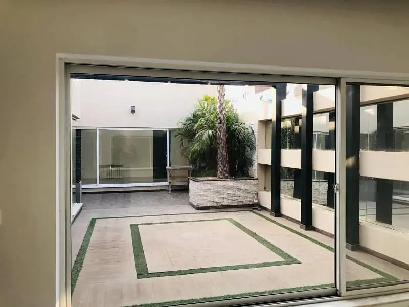 One Kanal Modern Bungalow for Sale in DHA Lahore with Solar and Servant Quarters