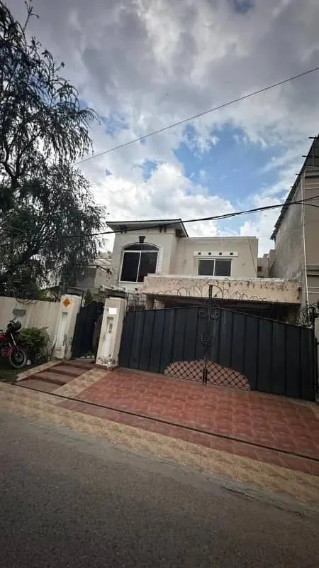 18 Marla Well-Maintained Spanish Bungalow in Prime DHA Lahore Location