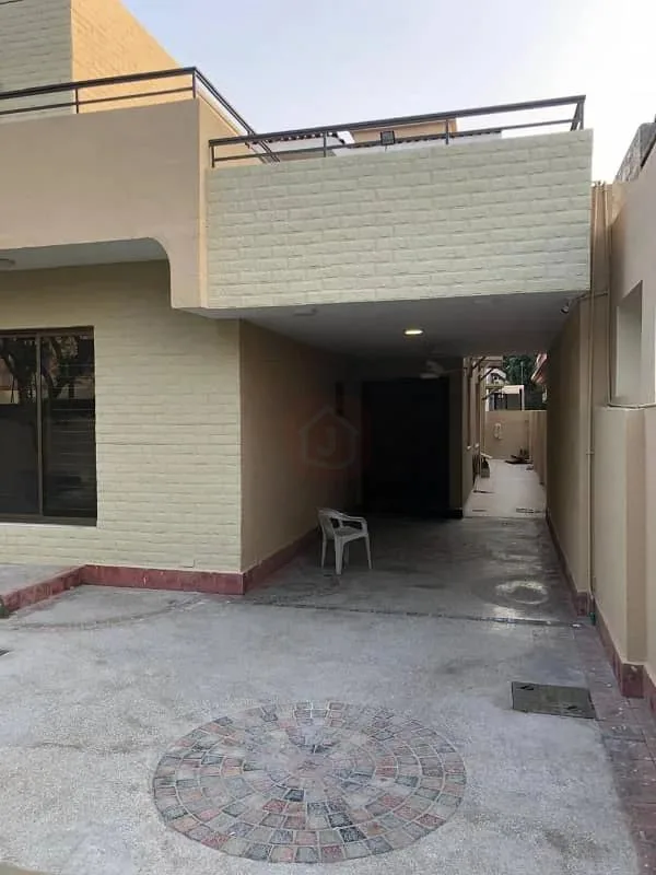 One Kanal Used Bungalow Available in DHA Lahore Near Park & Market