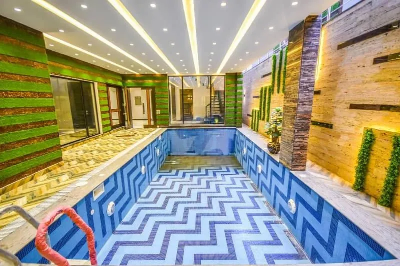 Contemporary Bungalow with Full Basement Pool & Home Theater for Sale