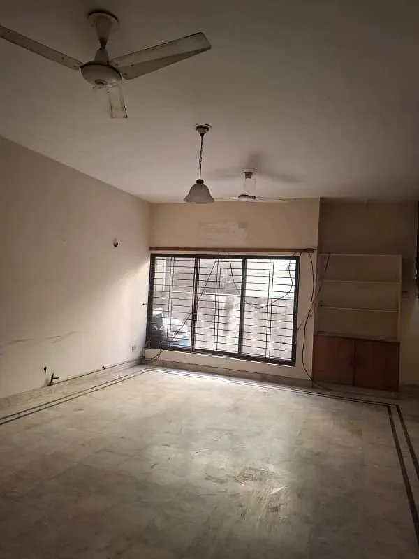 One Kanal Used Bungalow for Sale in DHA Lahore Near Park and Market