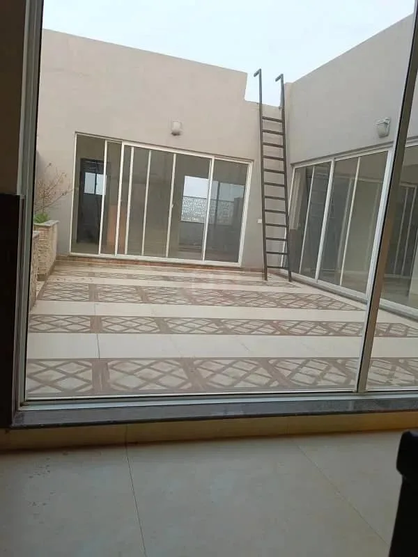 One Kanal Designer Bungalow For Sale in DHA Lahore Near Park and Market