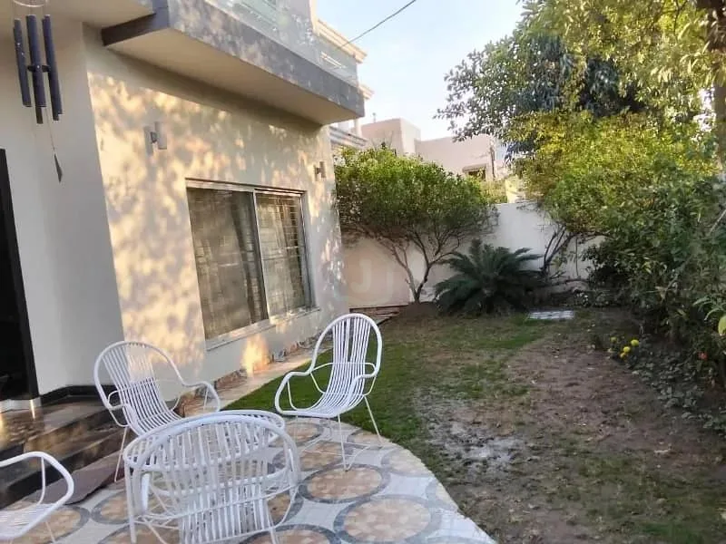 One Kanal Used Bungalow For Sale in DHA Lahore, Near Park and Market