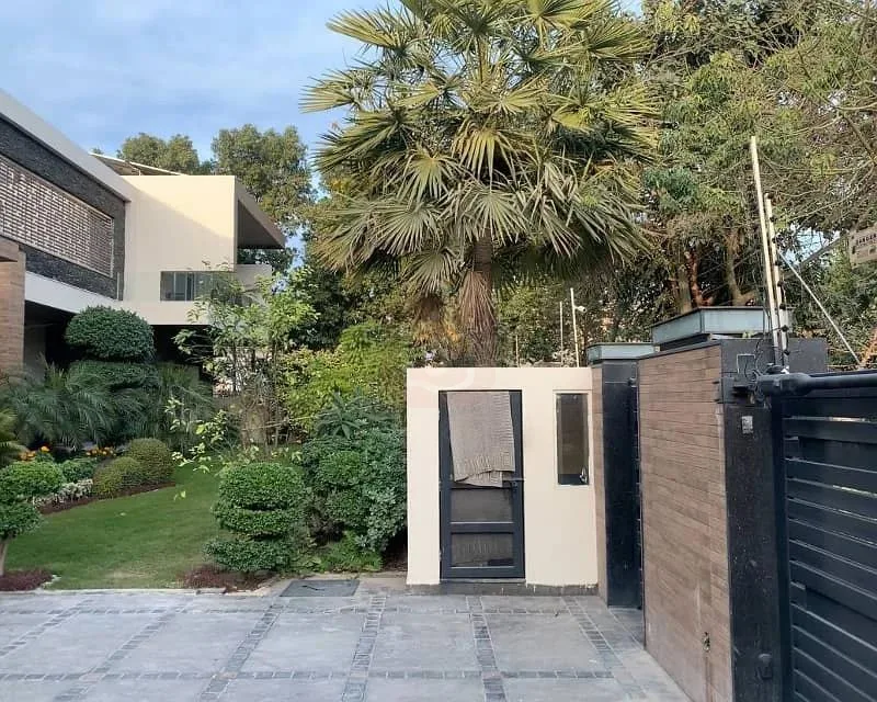 Stunning 2 Kanal 7 Bedroom Bungalow with Basement and Pool in DHA Lahore