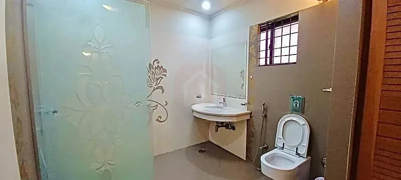 Modern One Kanal Bungalow in DHA Lahore Near Park and Market