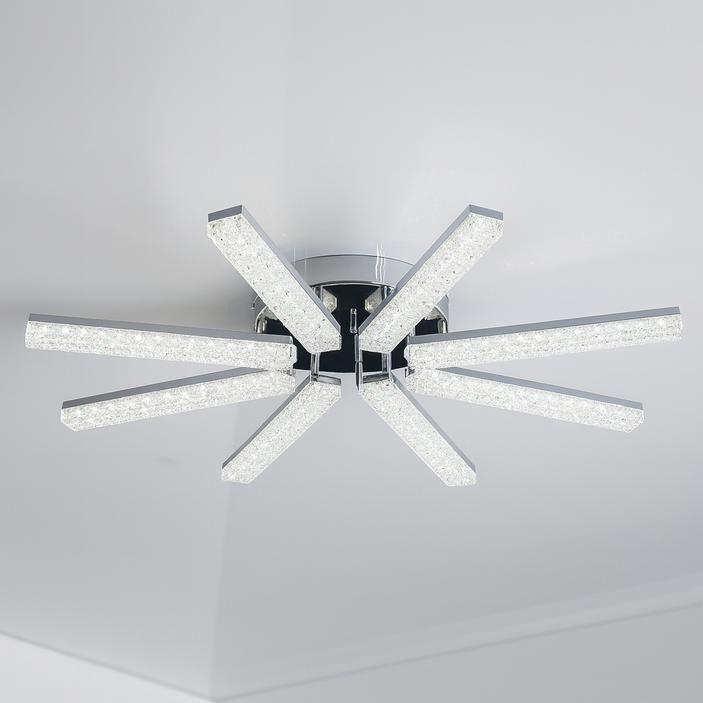 Оригінальна LED-люстра 160 Вт у вітальні 25 м² (Одеса), хромований корпус, білий акрил, регульоване світло 3000–6000 К, створює ефект відбитого сяйва й чисту геометрію освітлення.