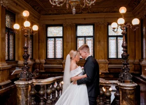 couple-newlyweds-hugging-luxury-hall-castle_8353-12333