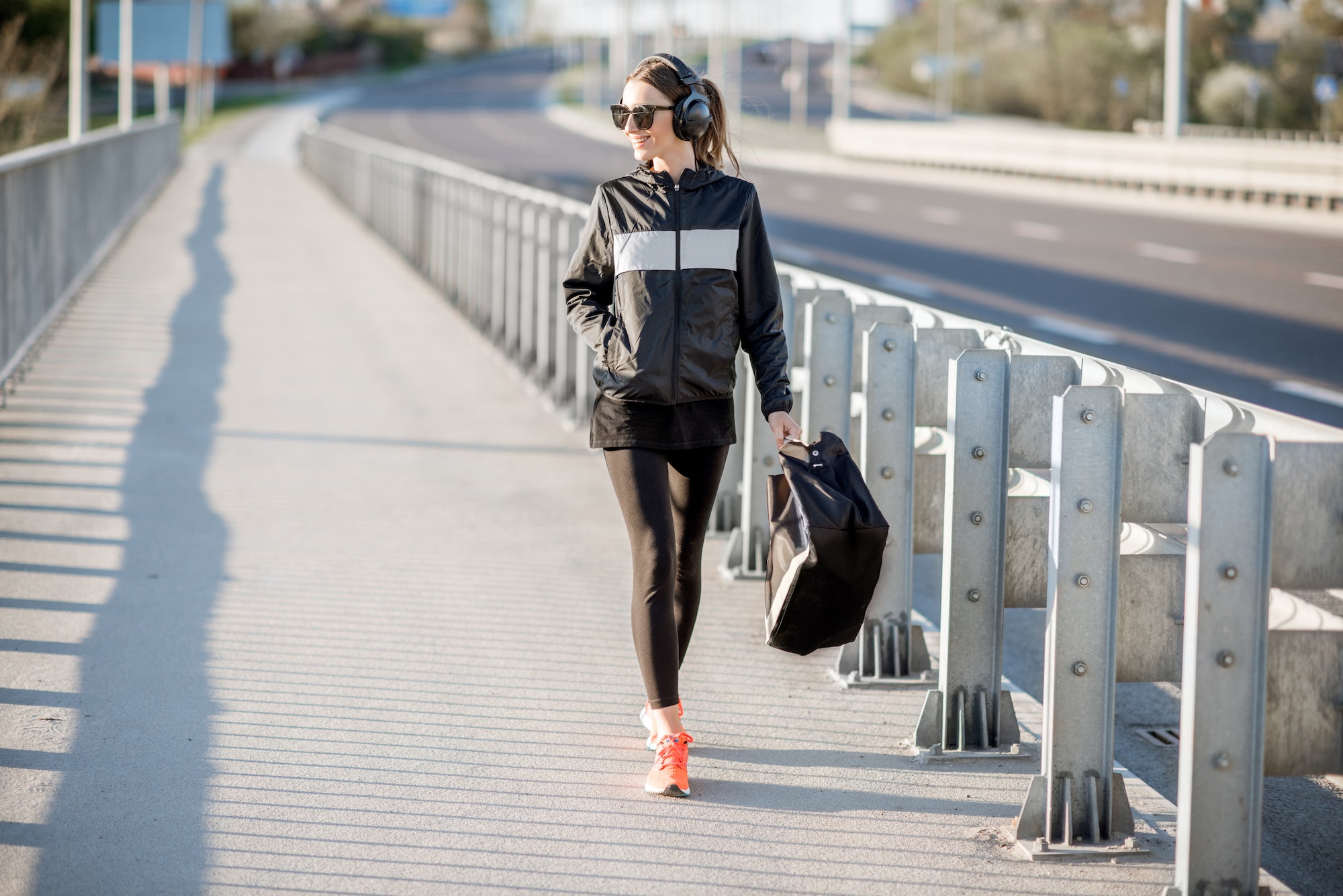 Sports woman walking after the training outdoors