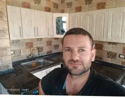 وسام تلي