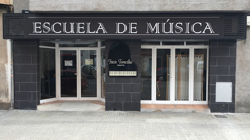 Escuela de Música Isicio Torrecillas (Piano & Guitarra & Canto)