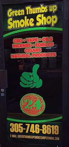 Green thumbs up smoke shop