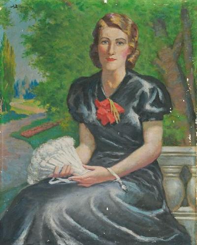 Portret kobiety na tle ogrodu
