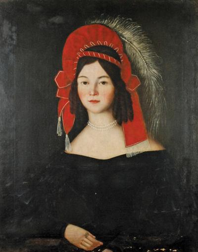 Dziewczyna w fantazyjnym nakryciu głowy