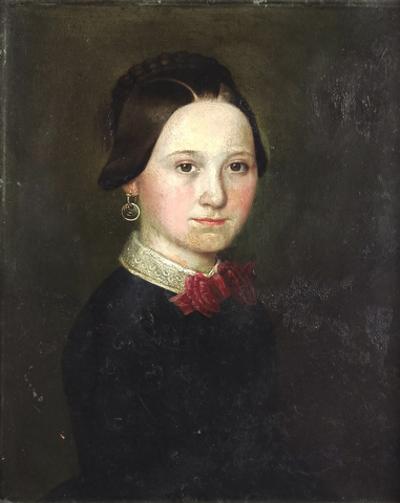 Portret kobiety z czerwoną kokardą