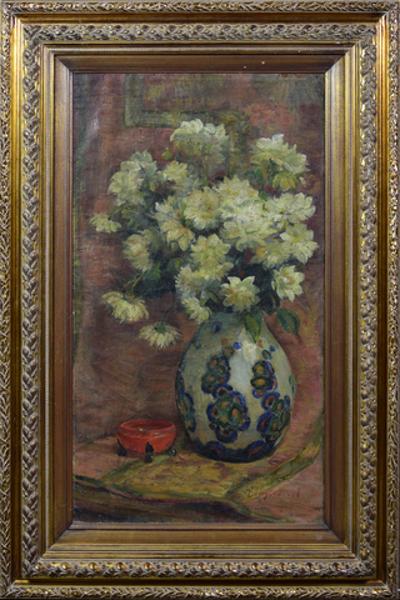 Kwiaty w ceramicznym wazonie