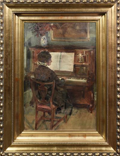Kobieta przy pianinie